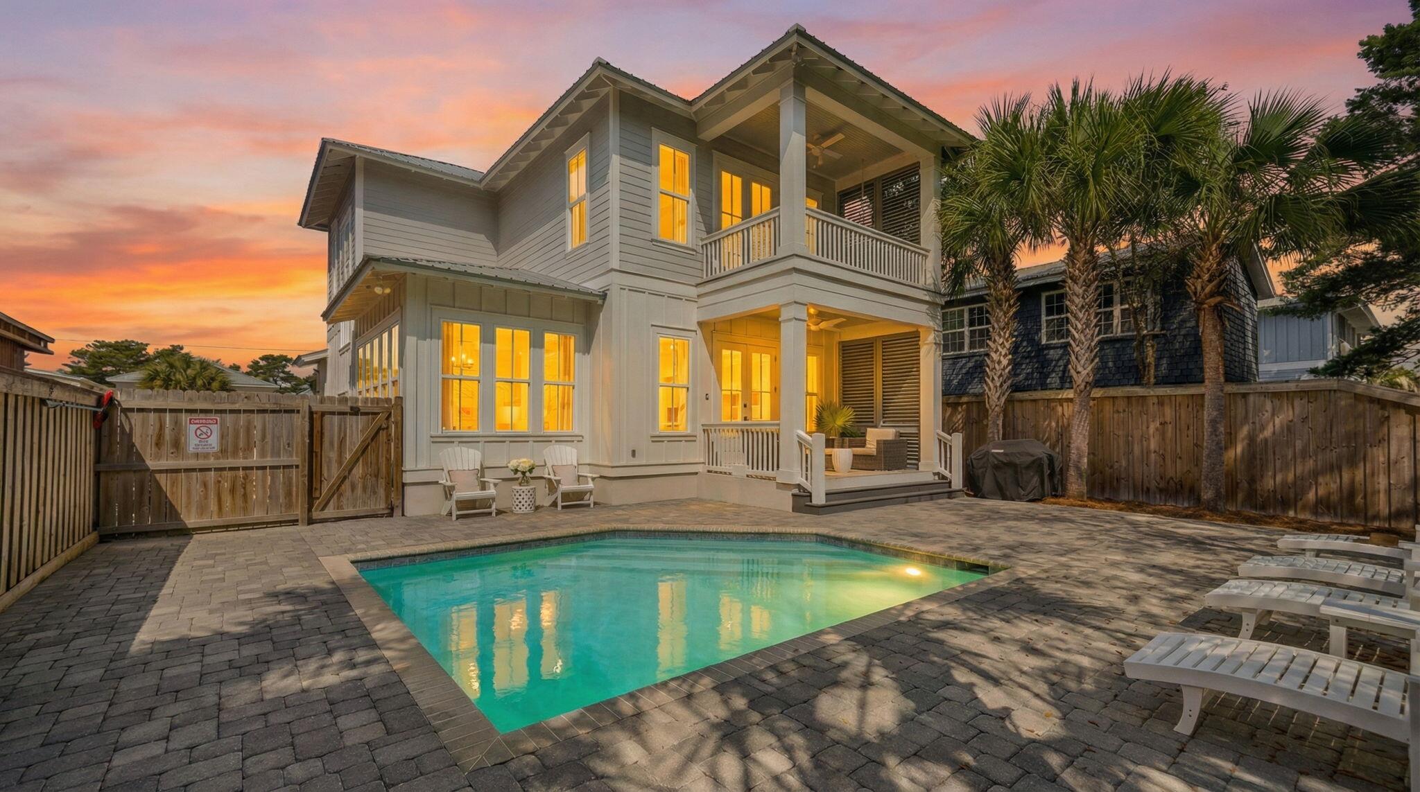 76 Brown Street Santa Rosa Beach, FL 32459 - Photo 46 of 48 a view of a house with a small yard and a large tree