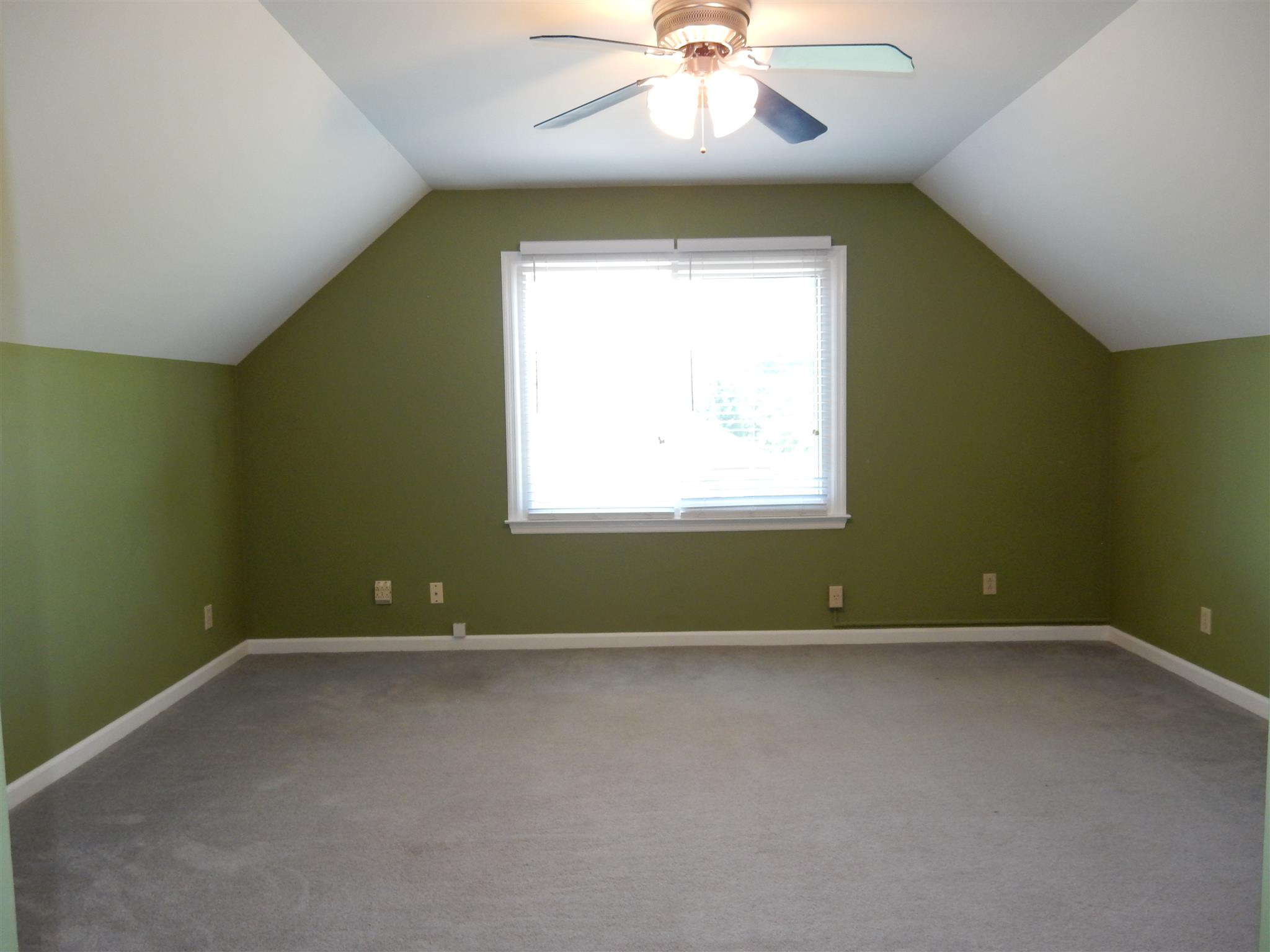 2884 Cages Bend Road Gallatin, TN 37066 - Photo 18 of 26 an empty room with a window and a fan