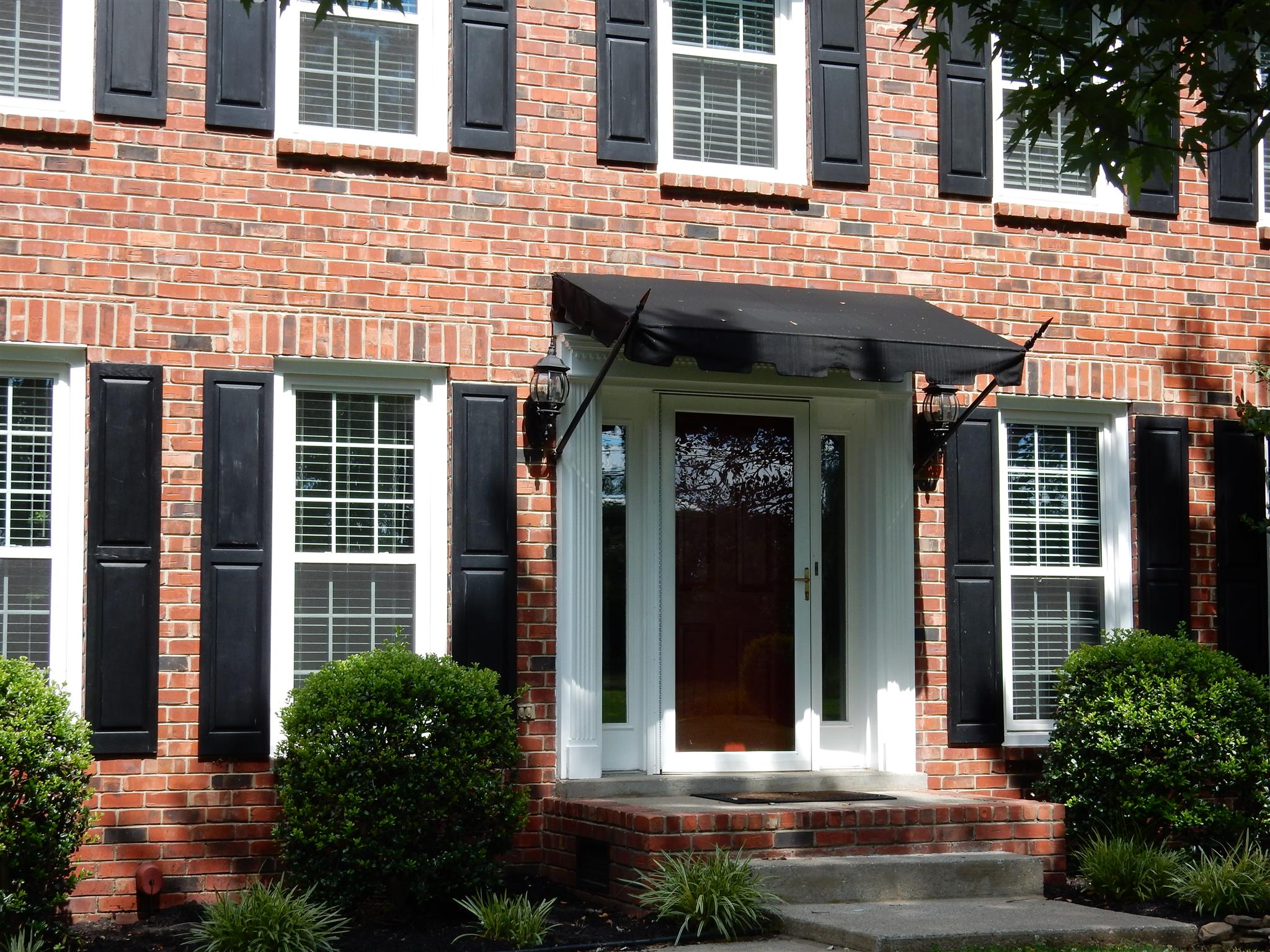 2884 Cages Bend Road Gallatin, TN 37066 - Photo 3 of 26 a view of brick building with a entrance