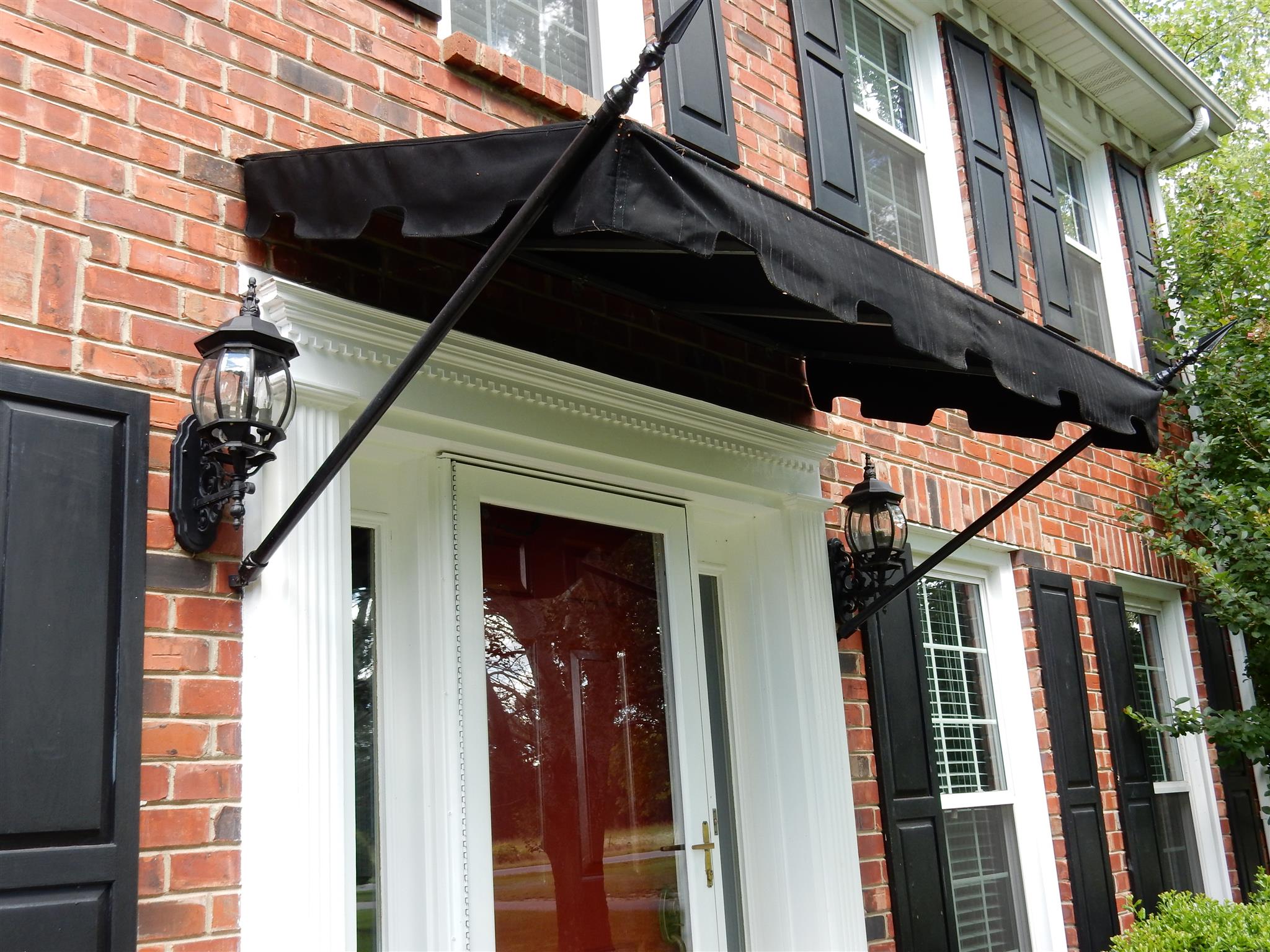 2884 Cages Bend Road Gallatin, TN 37066 - Photo 4 of 26 a view of a house with a door and wooden walls