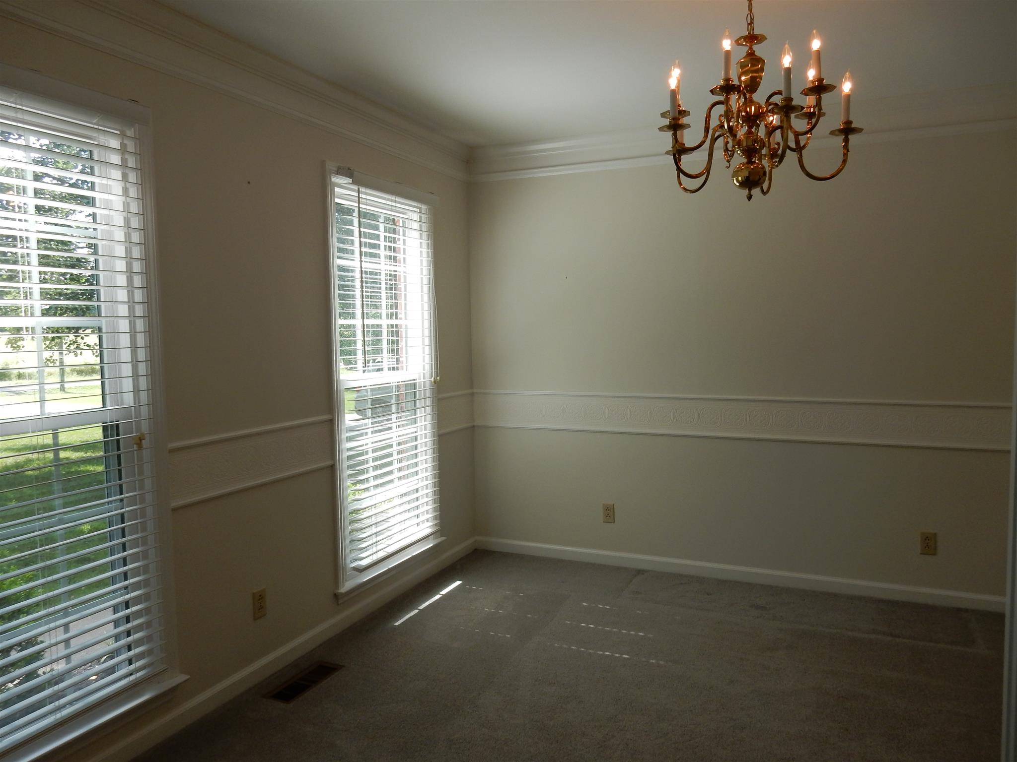 2884 Cages Bend Road Gallatin, TN 37066 - Photo 7 of 26 a view of empty room with windows