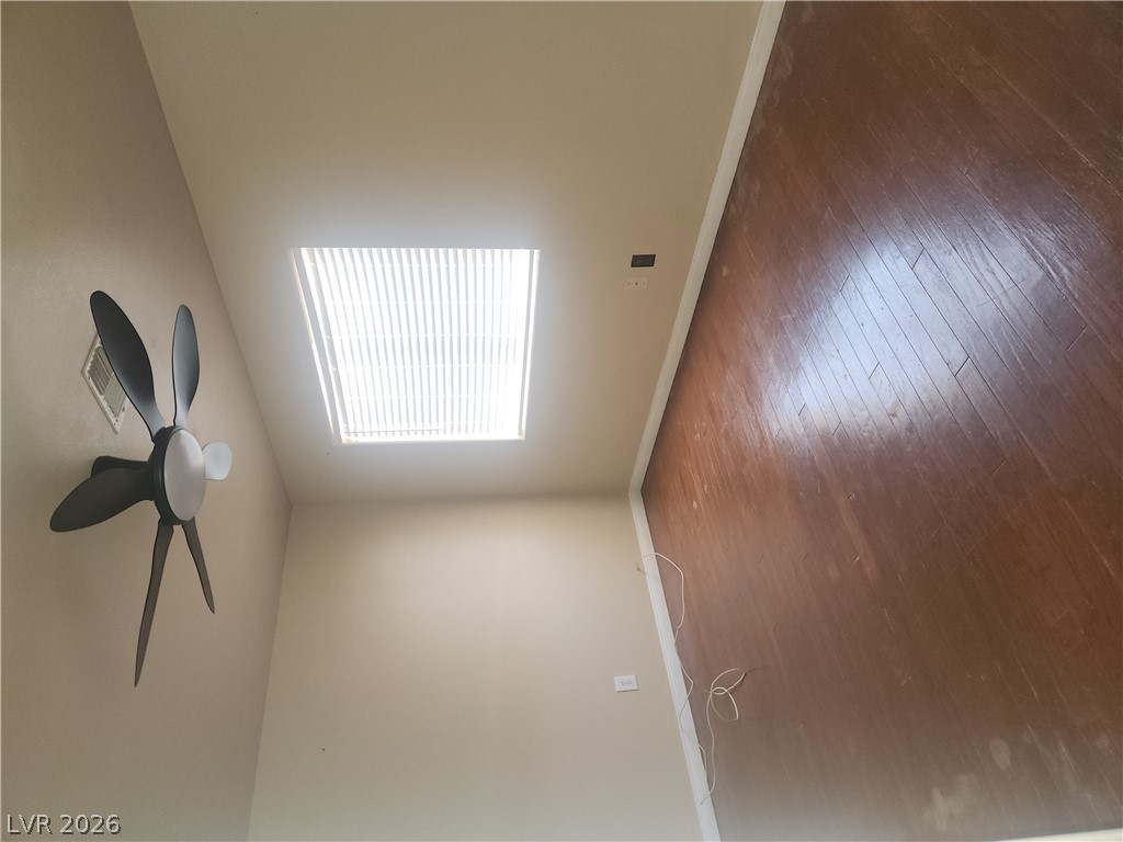 564 Ridgeway Road Henderson, NV 89015 - Photo 15 of 22 Natural light illuminates the rich hardwood flooring in this spacious, inviting room.