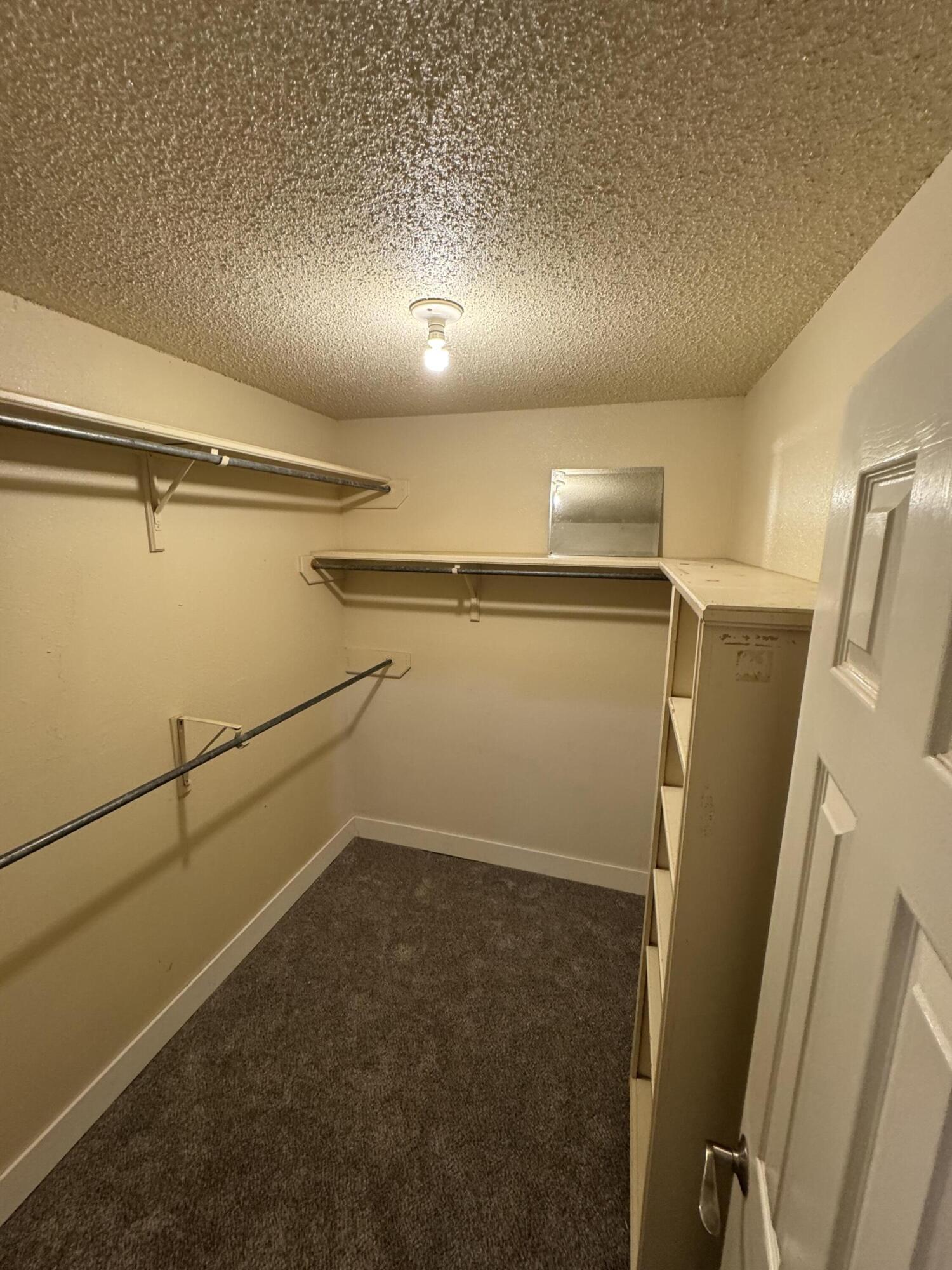 4402 78th Street Lubbock, TX 79424 - Photo 23 of 43 a view of a room with racks on the wall