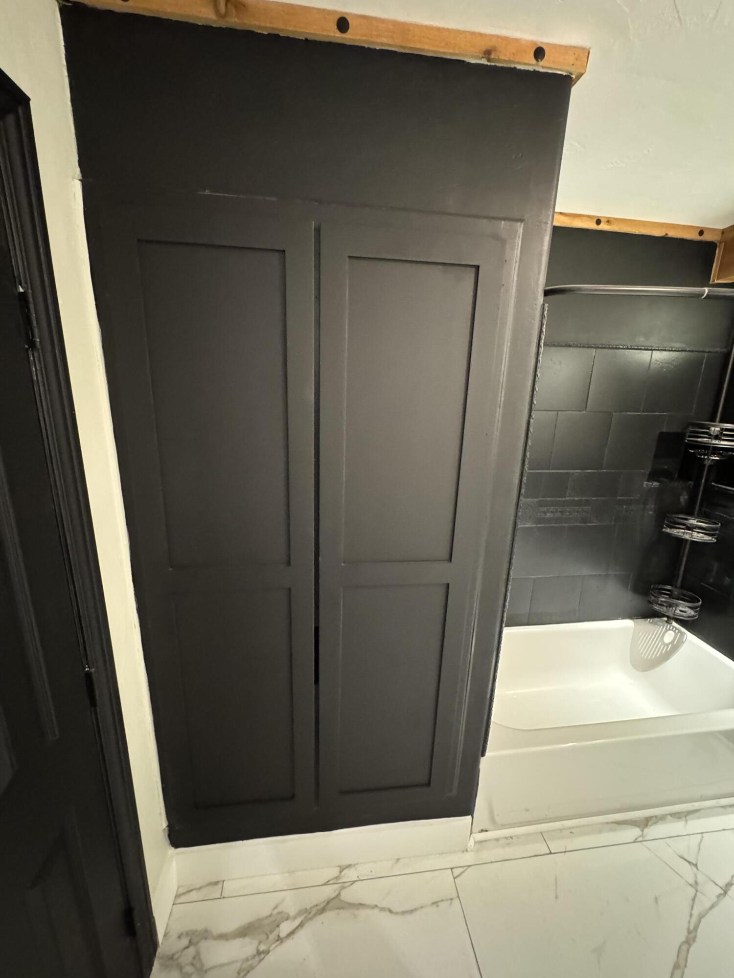 4402 78th Street Lubbock, TX 79424 - Photo 33 of 43 a bathroom with a sink and mirror