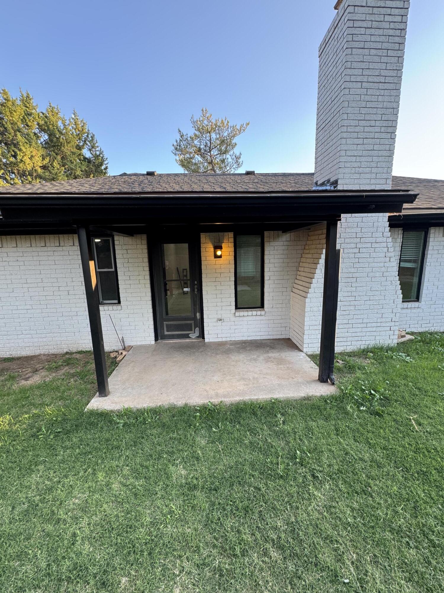 4402 78th Street Lubbock, TX 79424 - Photo 40 of 43 a backyard of a house with lots of green space