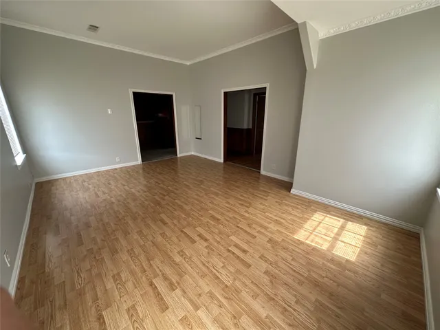a view of an empty room and window