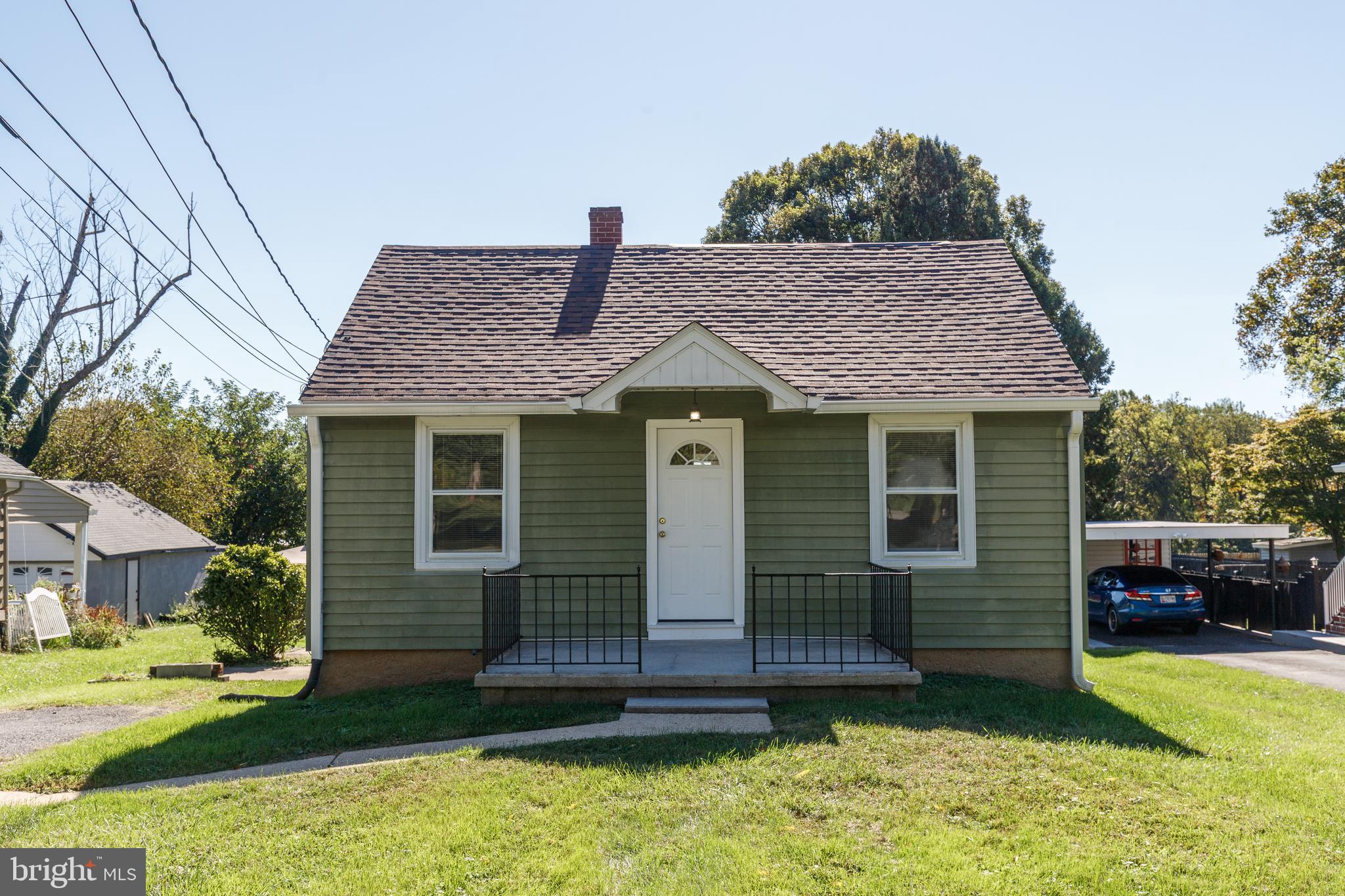 15 Ritters Lane Owings Mills, MD 21117 - Photo 30 of 30 a front view of a house with a yard