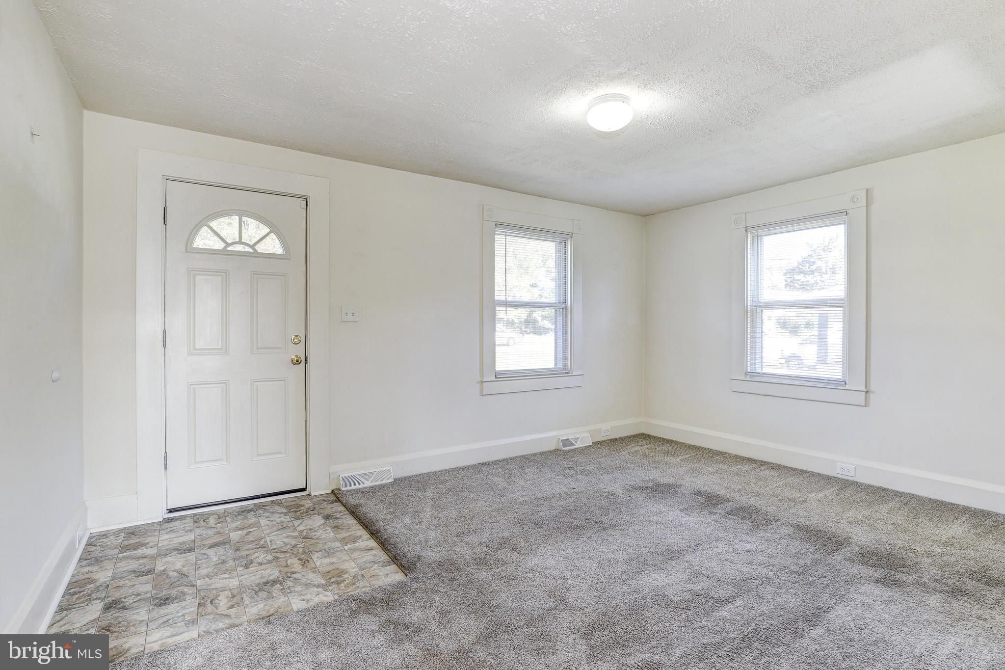 15 Ritters Lane Owings Mills, MD 21117 - Photo 4 of 30 a view of an empty room with a window