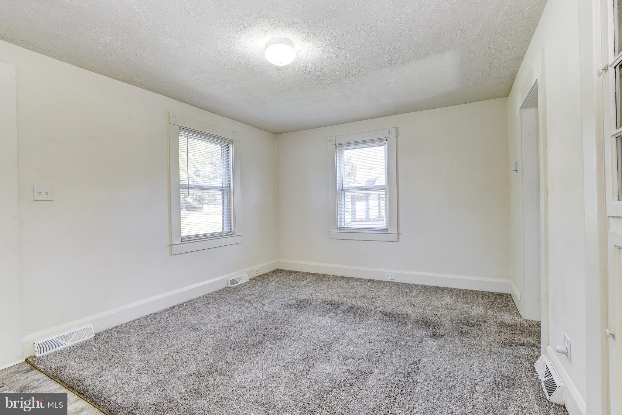 15 Ritters Lane Owings Mills, MD 21117 - Photo 7 of 30 an empty room with windows