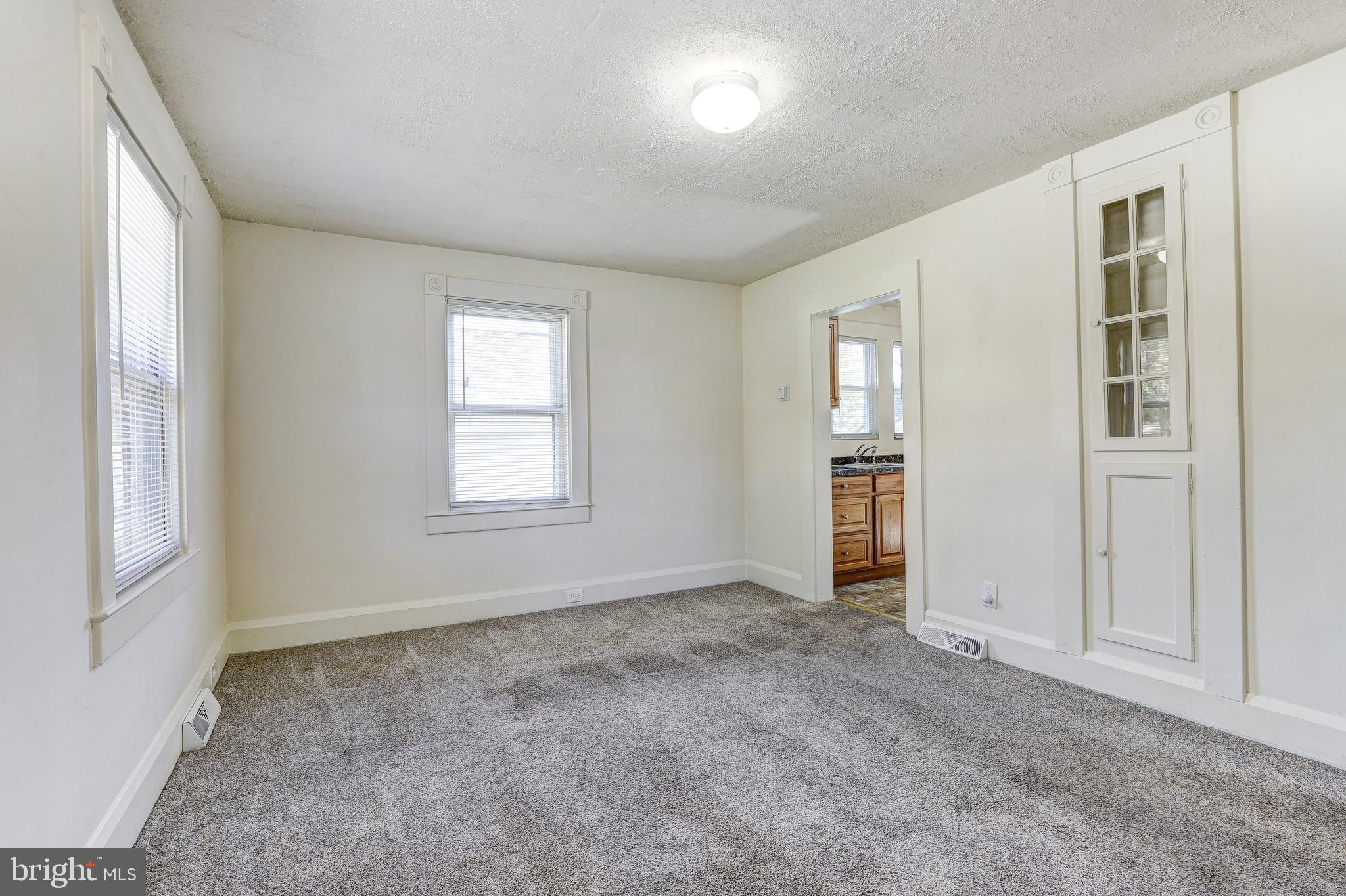 15 Ritters Lane Owings Mills, MD 21117 - Photo 9 of 30 an empty room with windows