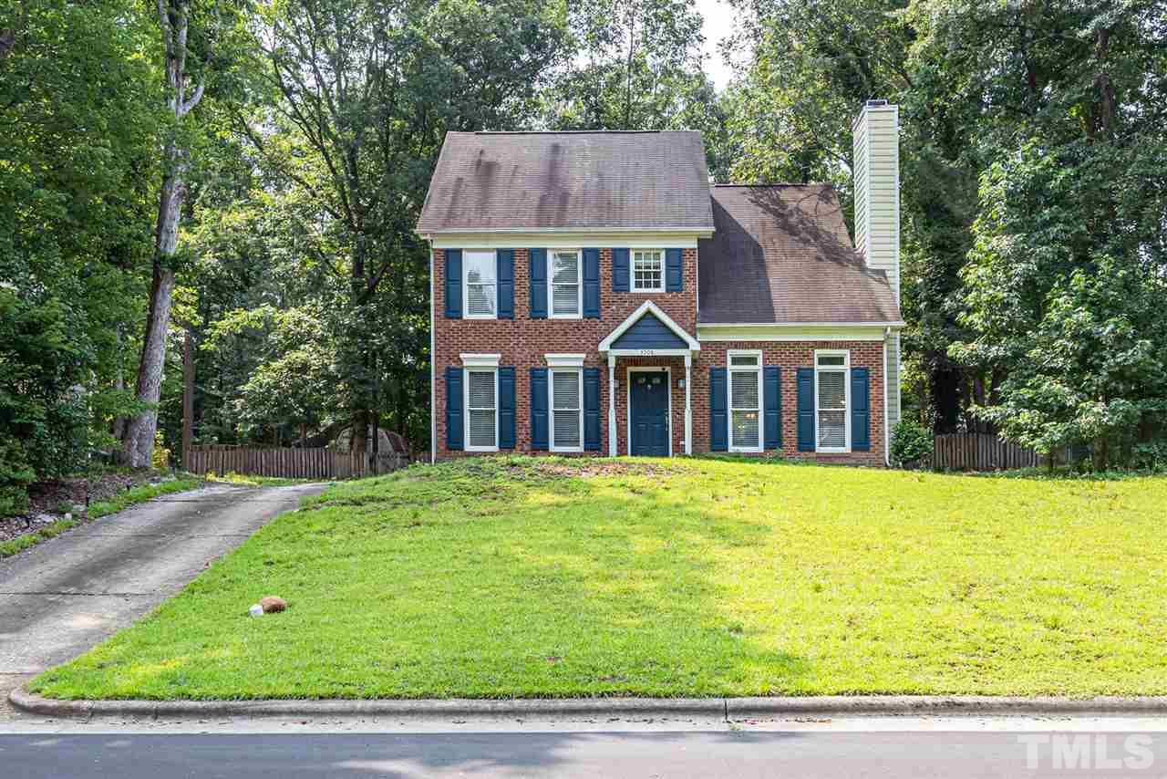 3508 Singleleaf Lane Raleigh, NC 27616 - Photo 1 of 20 a front view of a house with a garden