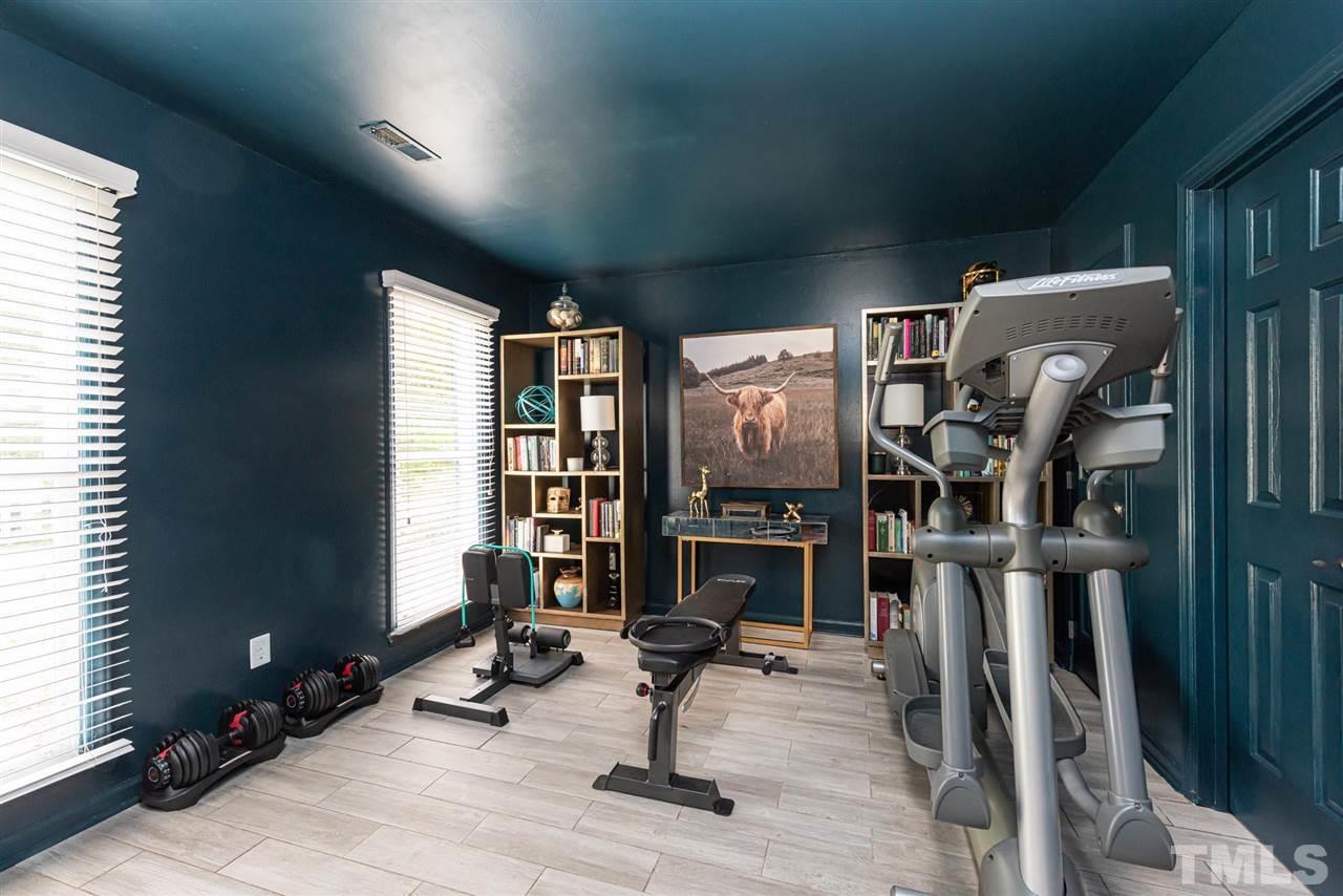 3508 Singleleaf Lane Raleigh, NC 27616 - Photo 12 of 20 a view of a room with gym equipment