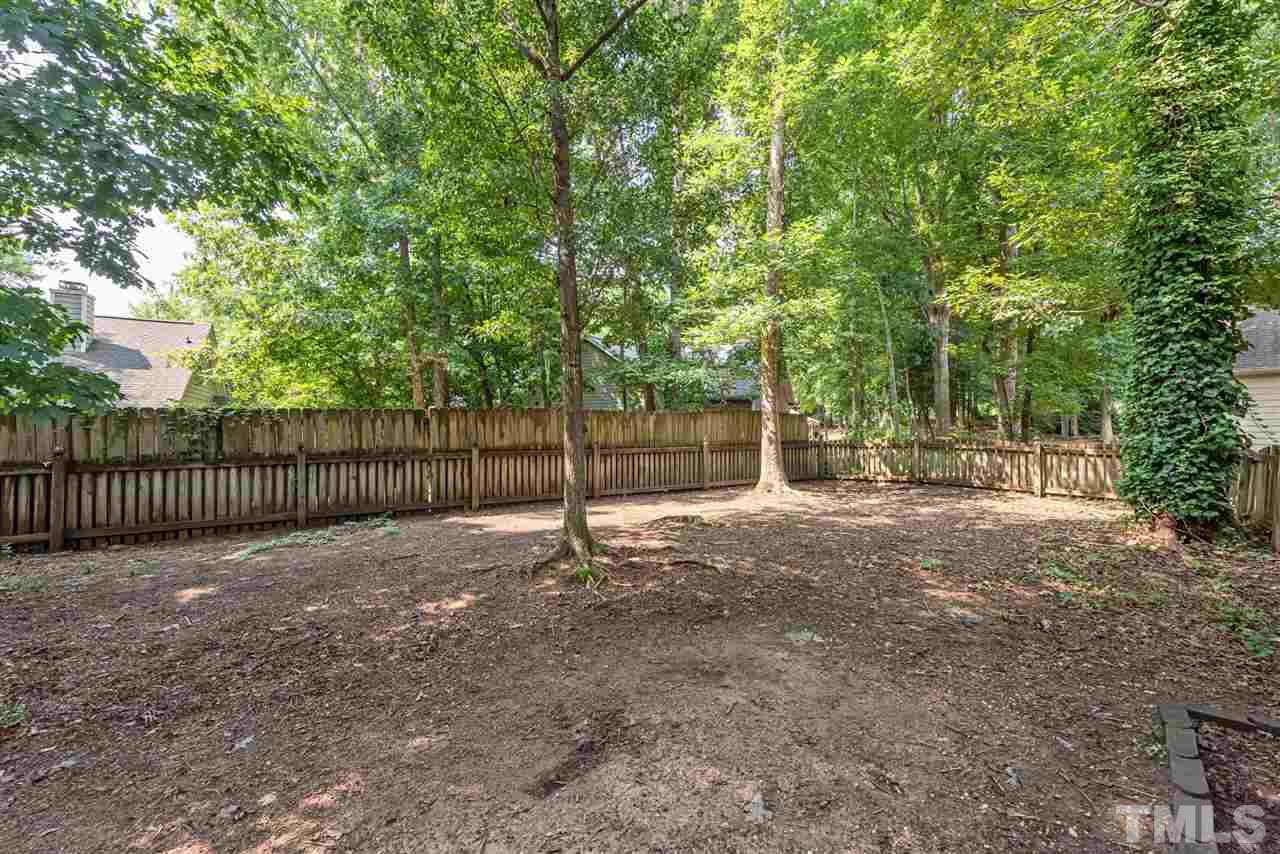3508 Singleleaf Lane Raleigh, NC 27616 - Photo 17 of 20 a view of a yard with a street