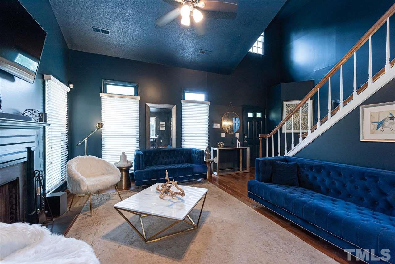3508 Singleleaf Lane Raleigh, NC 27616 - Photo 4 of 20 a living room with furniture and a fireplace