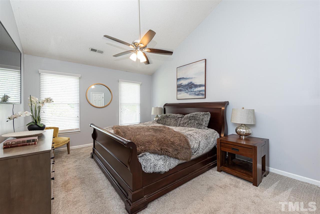 3508 Singleleaf Lane Raleigh, NC 27616 - Photo 10 of 20 a bed room with a bed and window