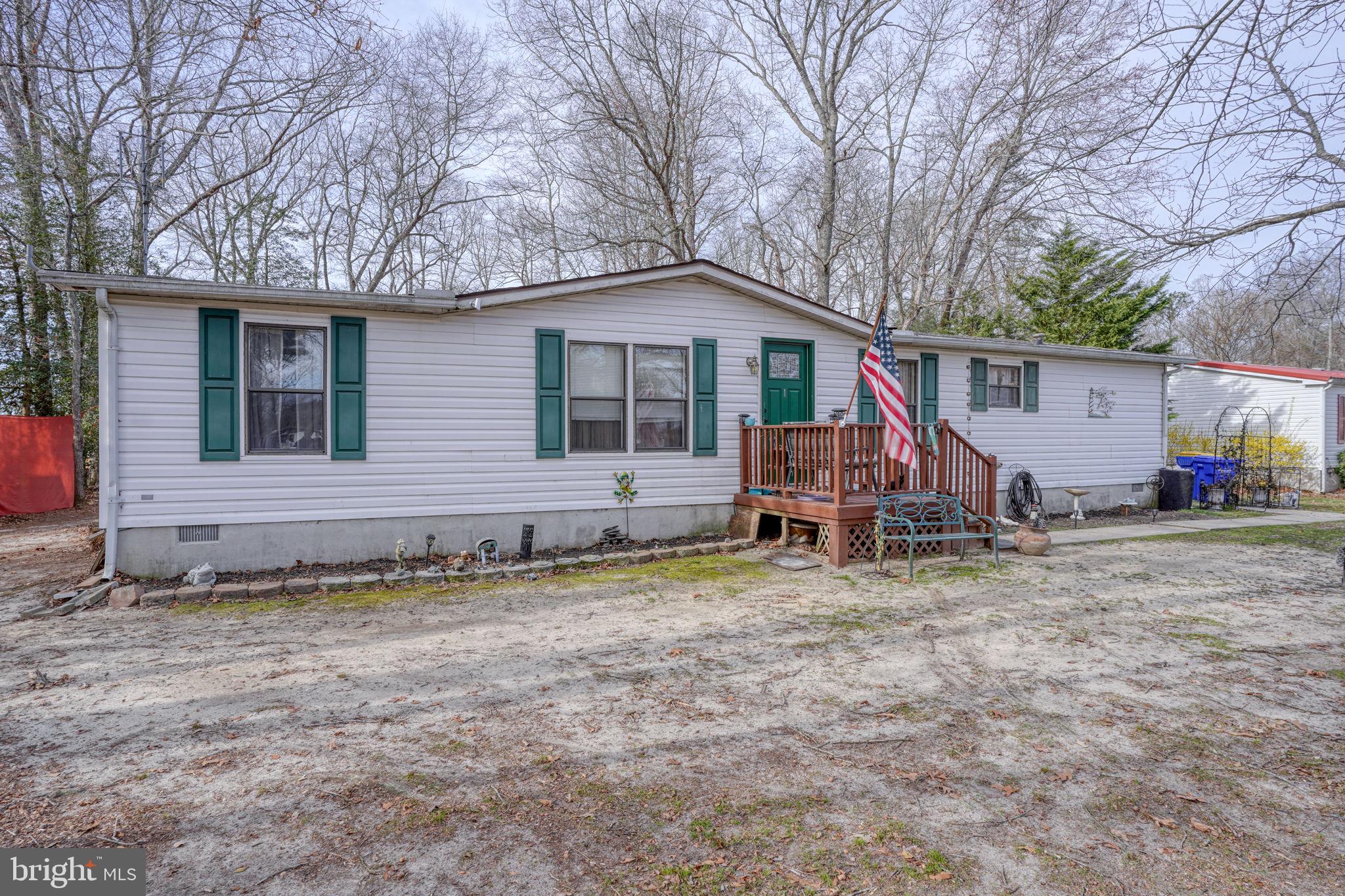 15450 Weigela Drive Georgetown, DE 19947 - Photo 11 of 37 Charming home with welcoming porch.