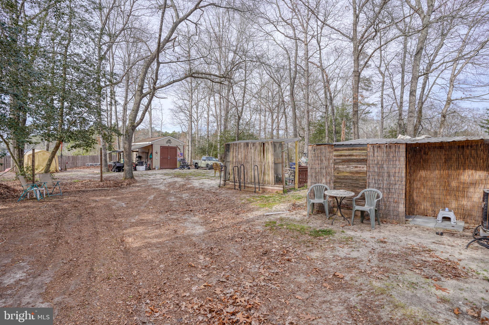 15450 Weigela Drive Georgetown, DE 19947 - Photo 12 of 37 Rustic retreat surrounded by nature.