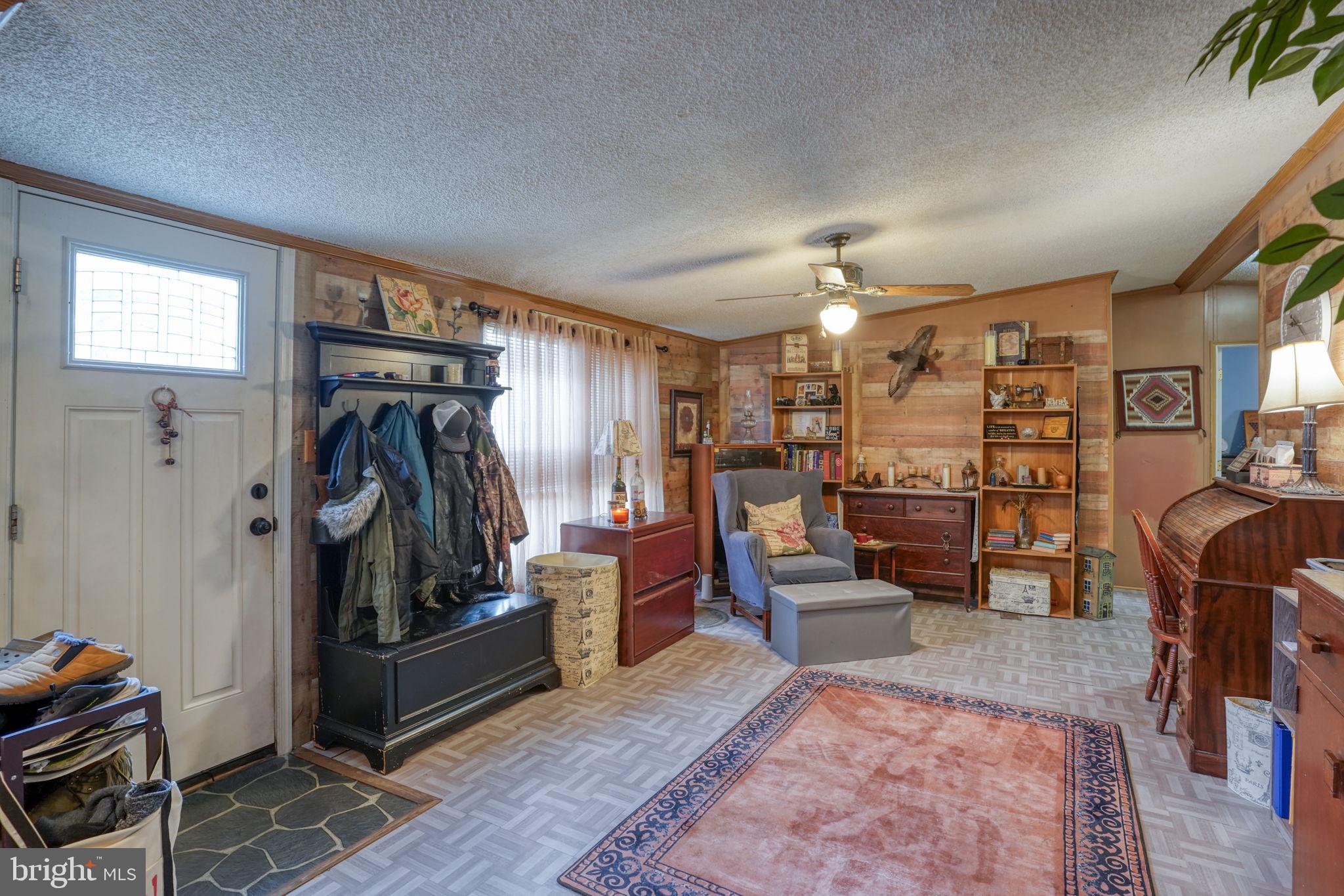 15450 Weigela Drive Georgetown, DE 19947 - Photo 18 of 37 Cozy entryway with warm accents.