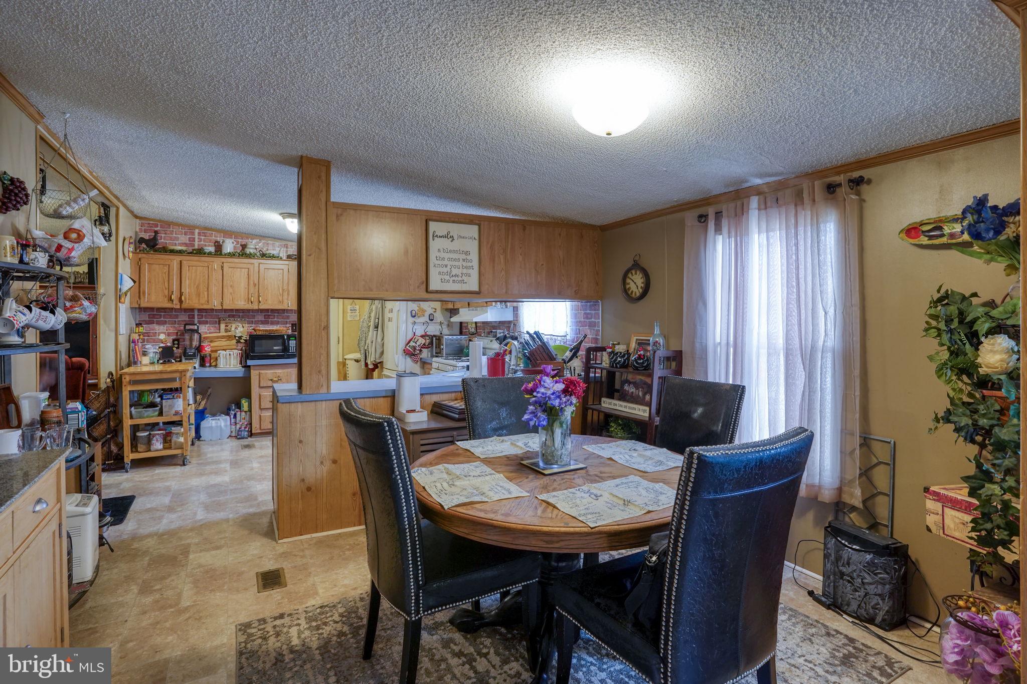 15450 Weigela Drive Georgetown, DE 19947 - Photo 20 of 37 Cozy dining area with natural light.