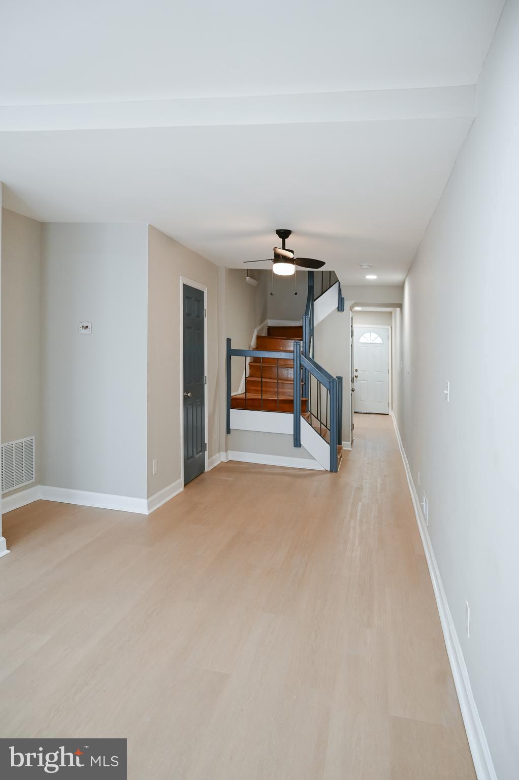 2214 East Fayette Street Baltimore, MD 21231 - Photo 11 of 40 a view of an empty room with furniture and window