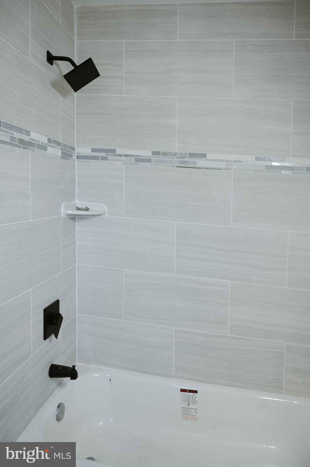 2214 East Fayette Street Baltimore, MD 21231 - Photo 20 of 40 a bathroom with a shower