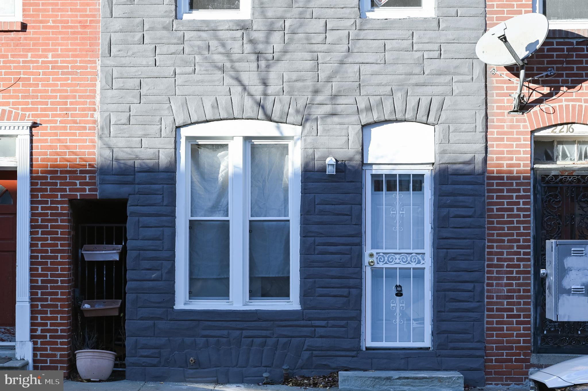 2214 East Fayette Street Baltimore, MD 21231 - Photo 40 of 40 a front view of a house with glass windows