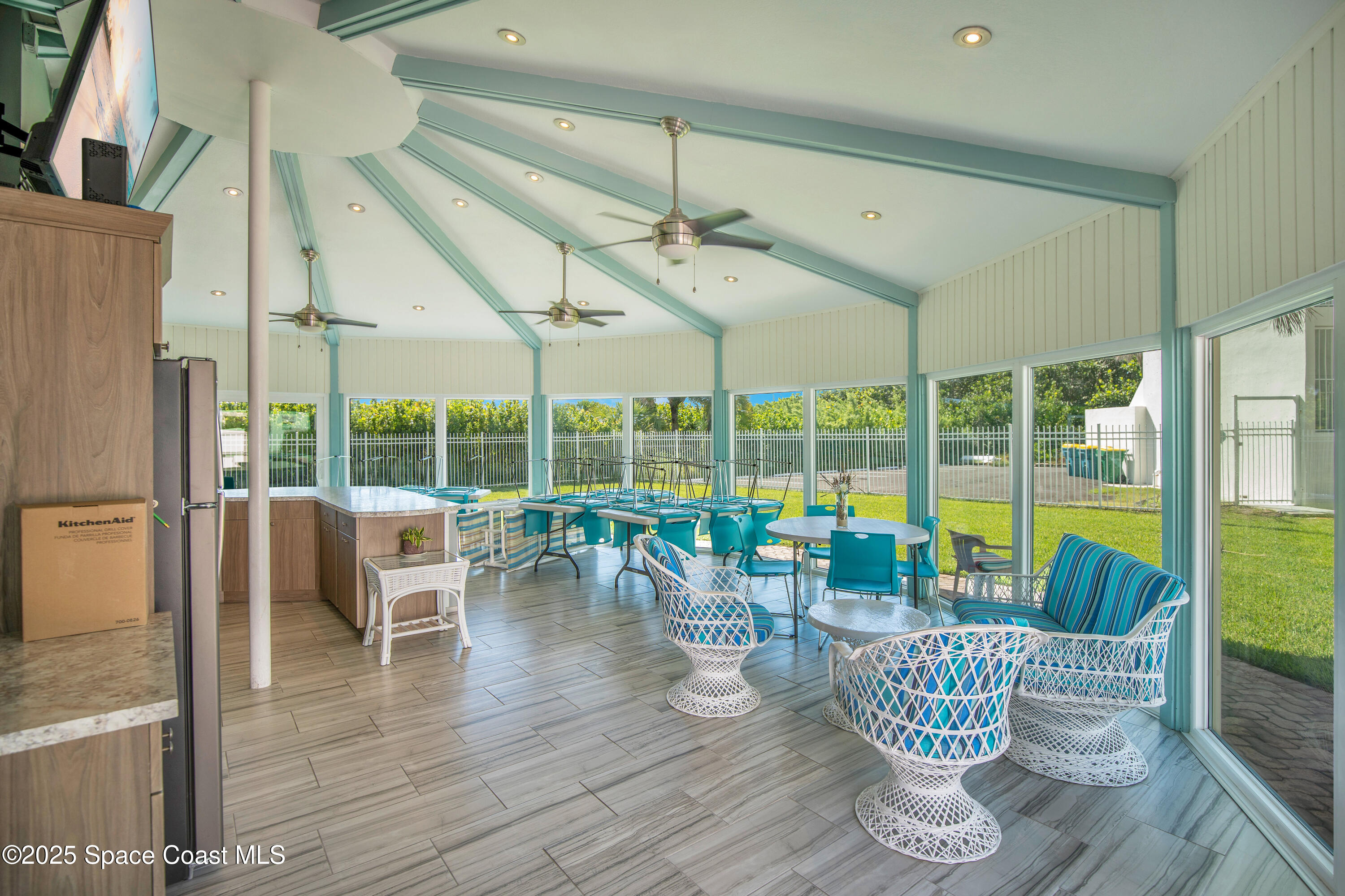 4000 Ocean Beach Boulevard, Unit 5C Cocoa Beach, FL 32931 - Photo 18 of 32 a dining room with furniture water view and a floor to ceiling window