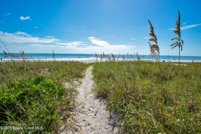 a view of balcony with furniture