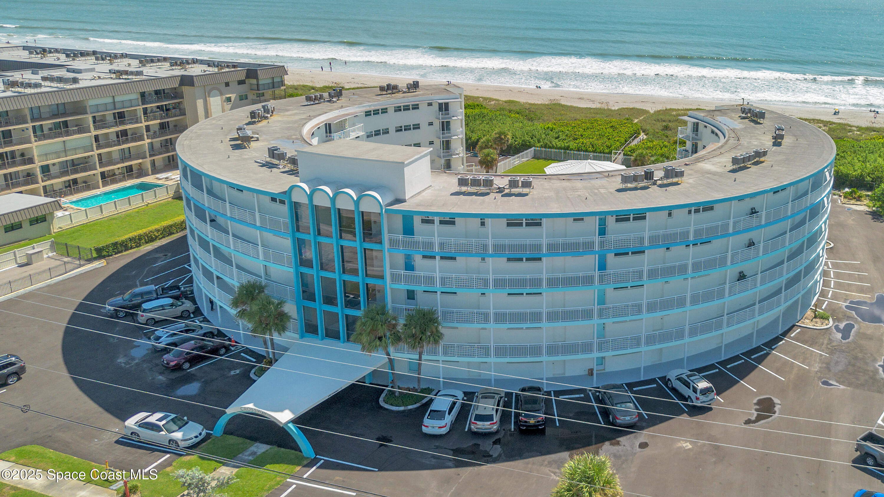 4000 Ocean Beach Boulevard, Unit 5C Cocoa Beach, FL 32931 - Photo 27 of 32 a view of swimming pool with a patio