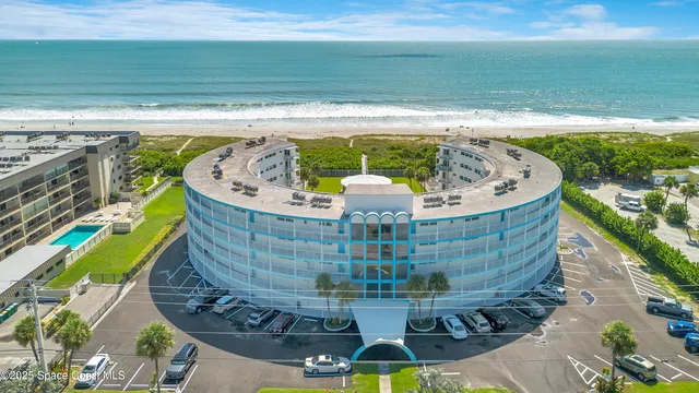 a view of a swimming pool with a garden