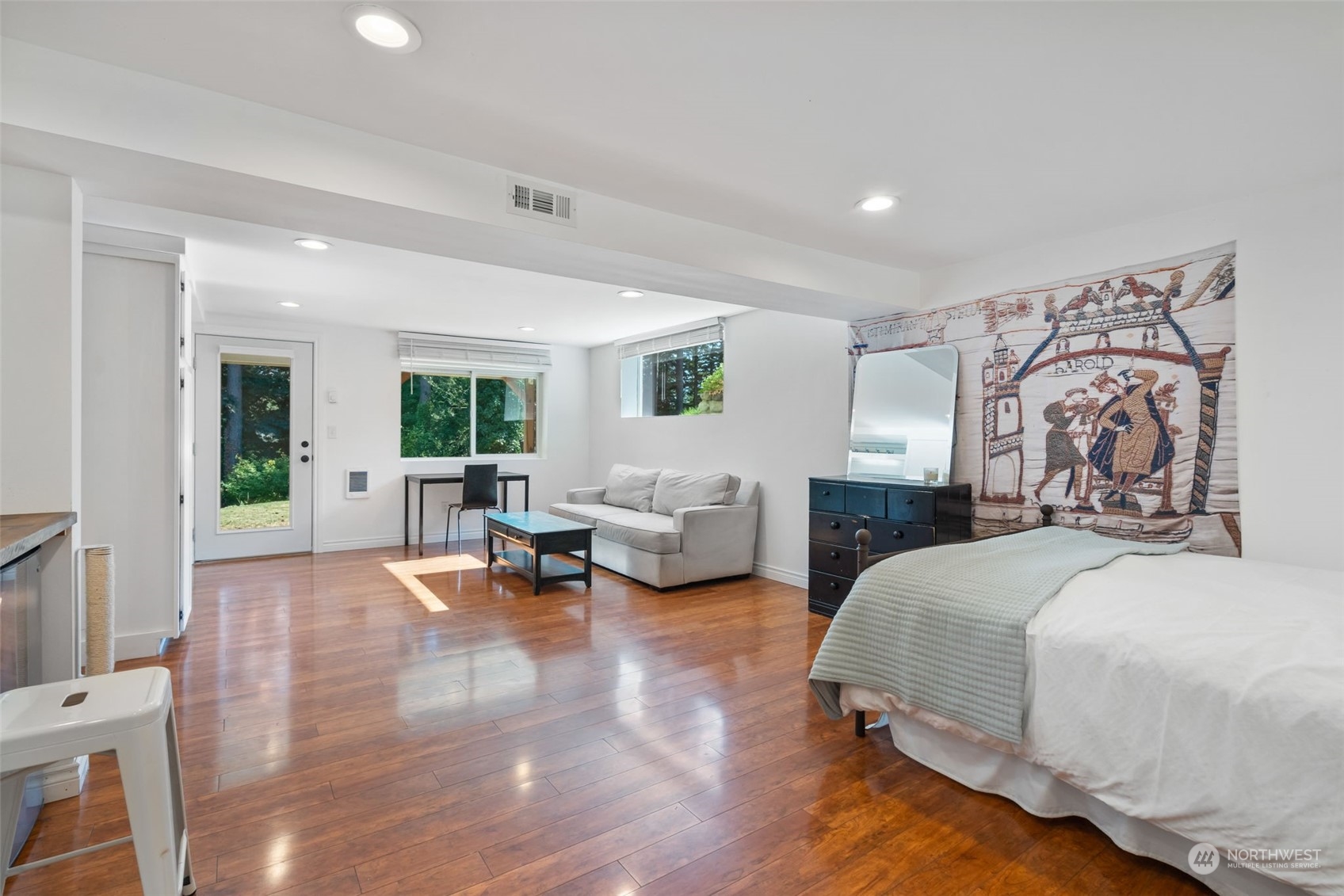 405 Parkridge Road Bellingham, WA 98225 - Photo 27 of 36 a spacious bedroom with double bed and a couch