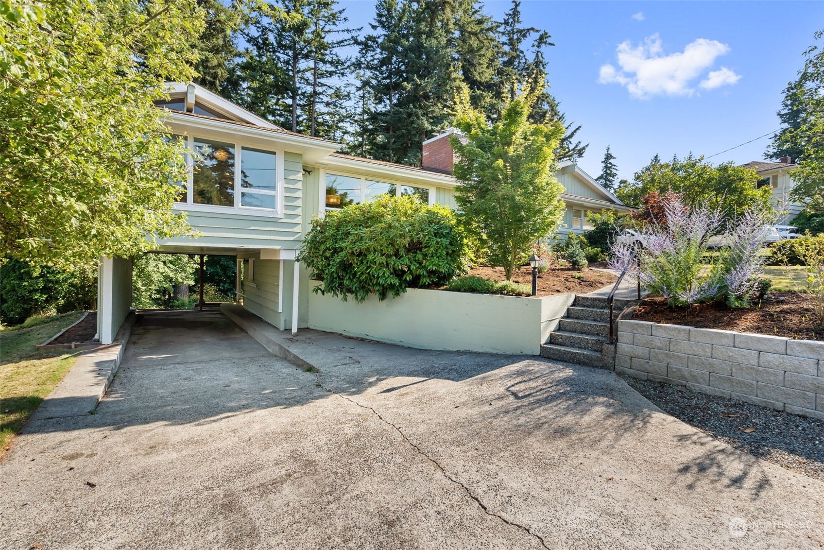 405 Parkridge Road Bellingham, WA 98225 - Photo 32 of 36 a view of a house with backyard and sitting area