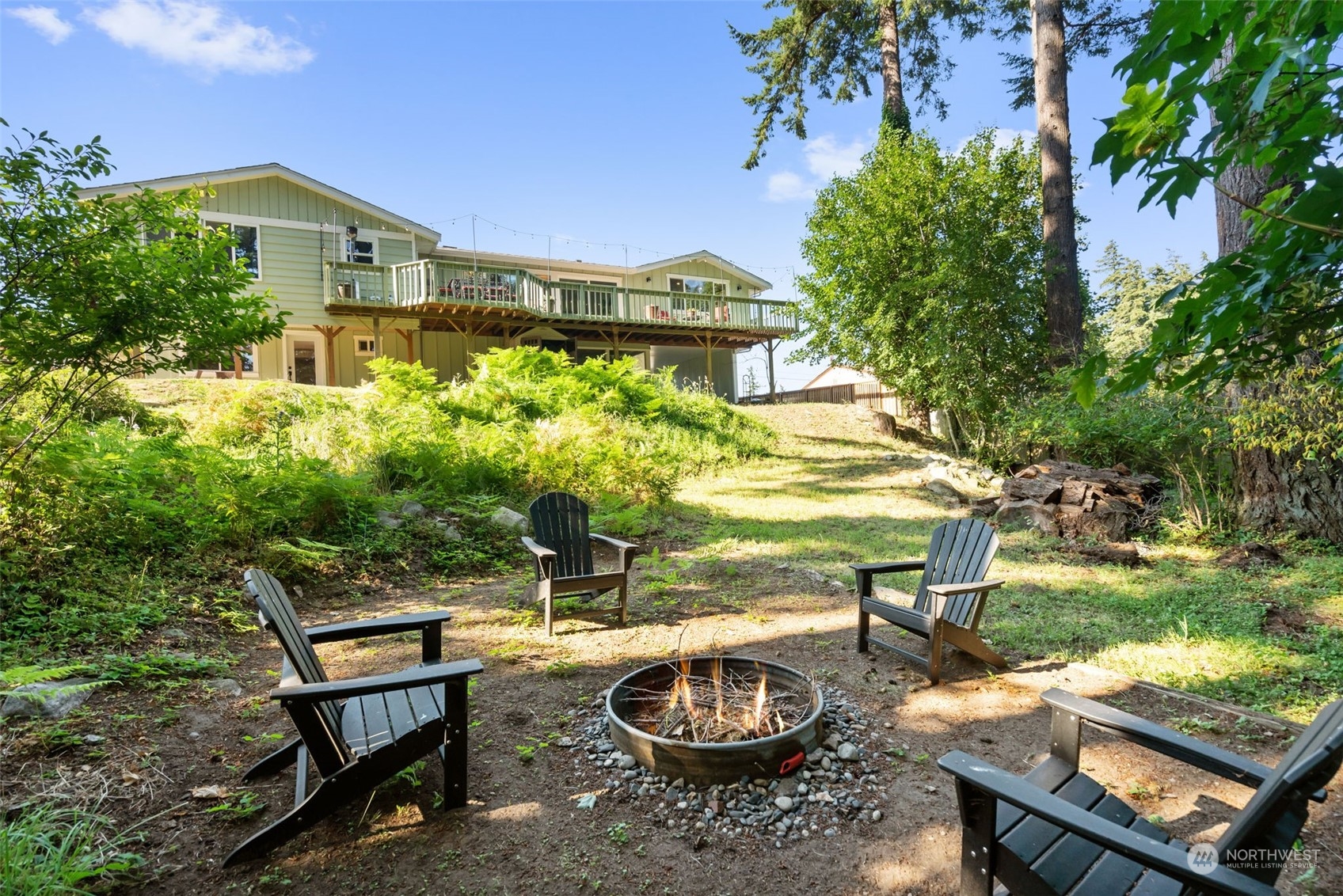 405 Parkridge Road Bellingham, WA 98225 - Photo 34 of 36 a backyard of a house with outdoor seating