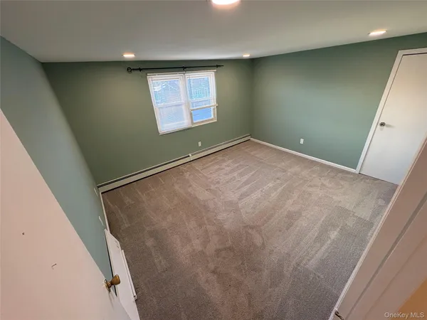 en empty room with windows