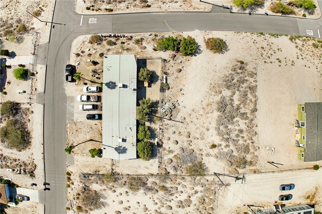13345 Mesquite Road, Unit 2 Whitewater, CA 92282 - Photo 11 of 12 a bathroom with a bathtub and shower curtain