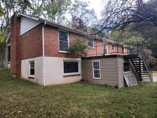 708 Vantrease Road Madison, TN 37115 - Photo 12 of 15 a front view of a house with garden
