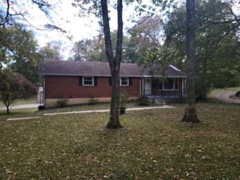 708 Vantrease Road Madison, TN 37115 - Photo 13 of 15 a house view with a backyard space