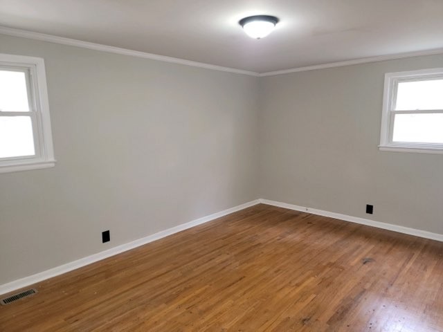 708 Vantrease Road Madison, TN 37115 - Photo 6 of 15 wooden floor in an empty room with a window