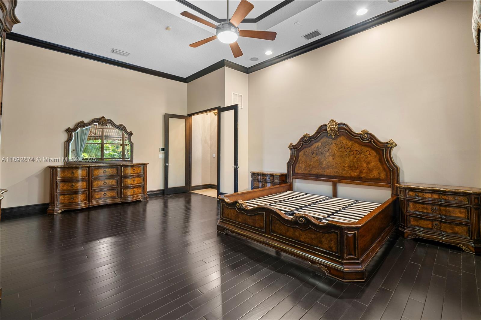 14130 Southwest 33rd Court Davie, FL 33330 - Photo 15 of 36 a bedroom with furniture and wooden floor