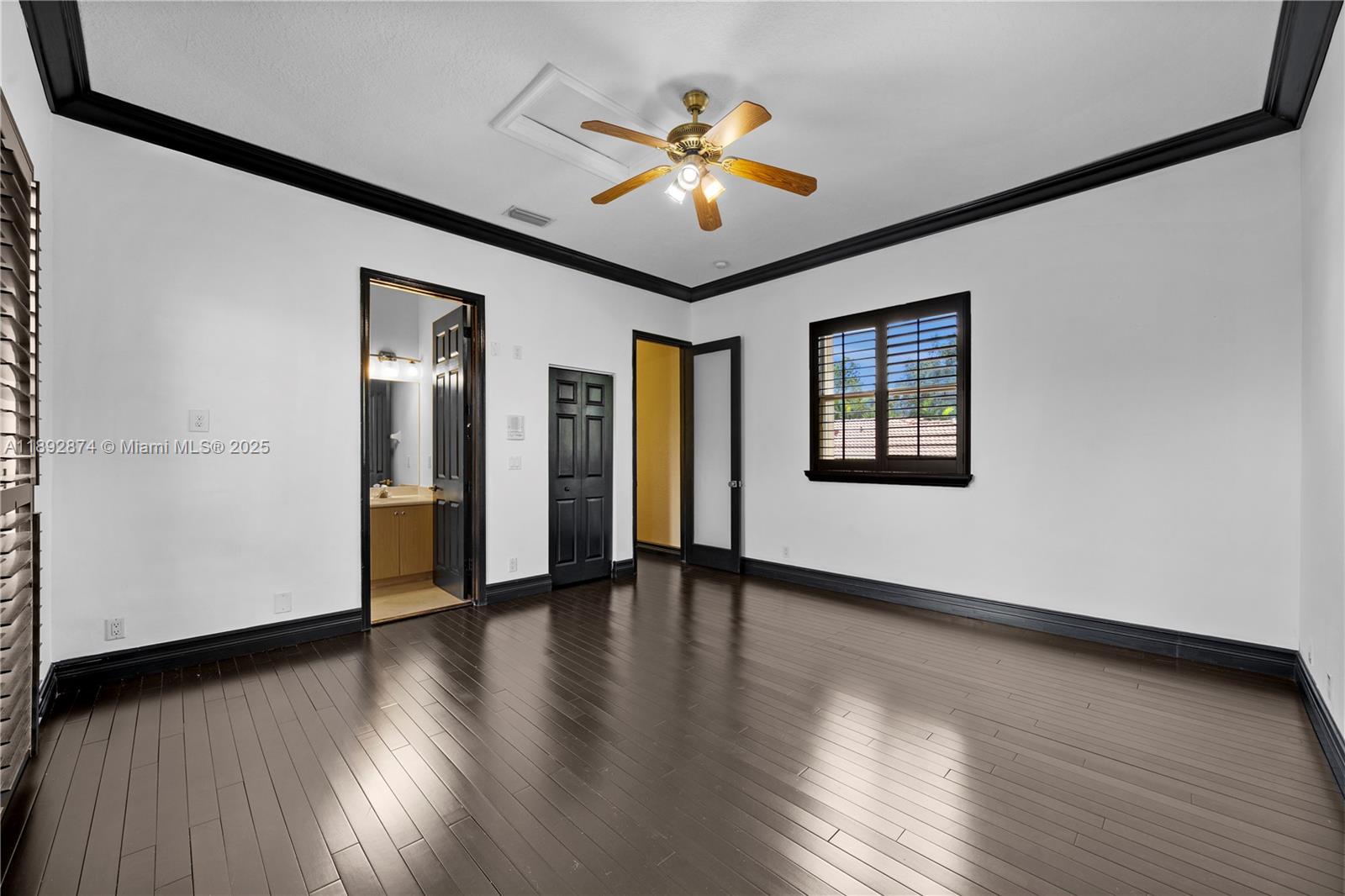 14130 Southwest 33rd Court Davie, FL 33330 - Photo 28 of 36 a view of an empty room with wooden floor and a window