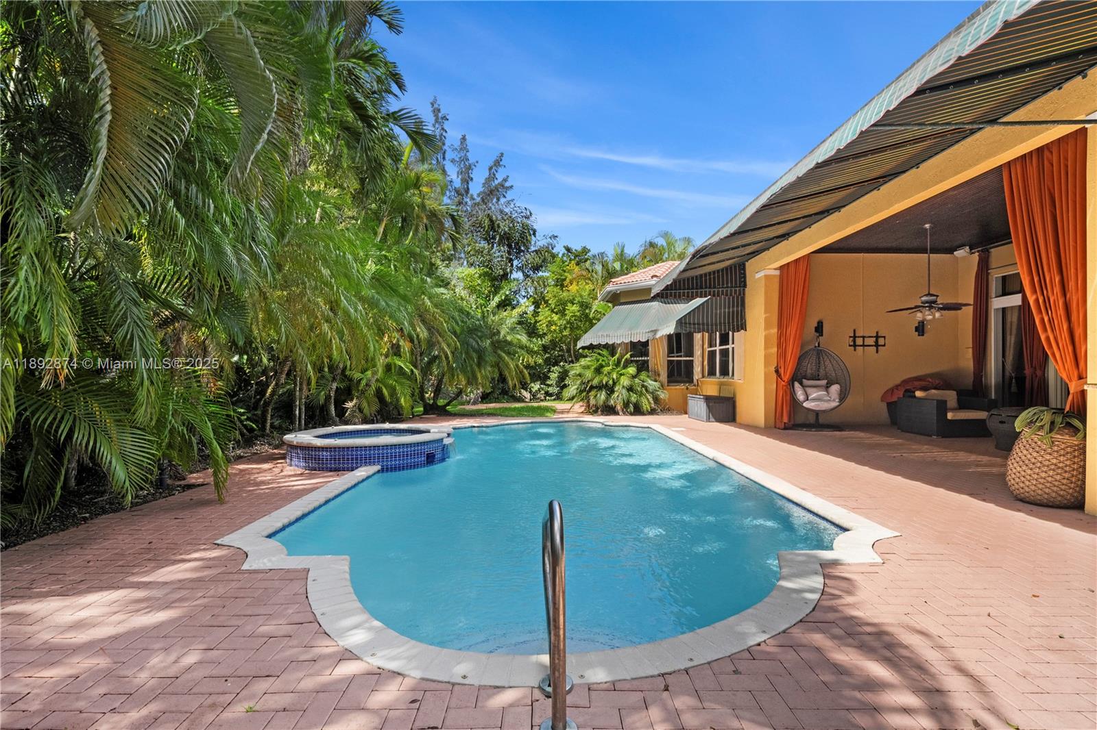 14130 Southwest 33rd Court Davie, FL 33330 - Photo 31 of 36 a view of a backyard with a patio