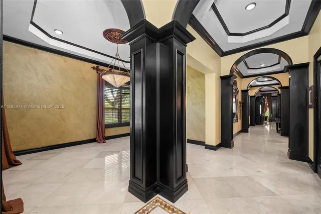 a view of a dining room with furniture and window