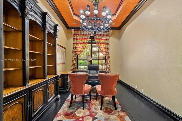 a kitchen with a refrigerator and a sink