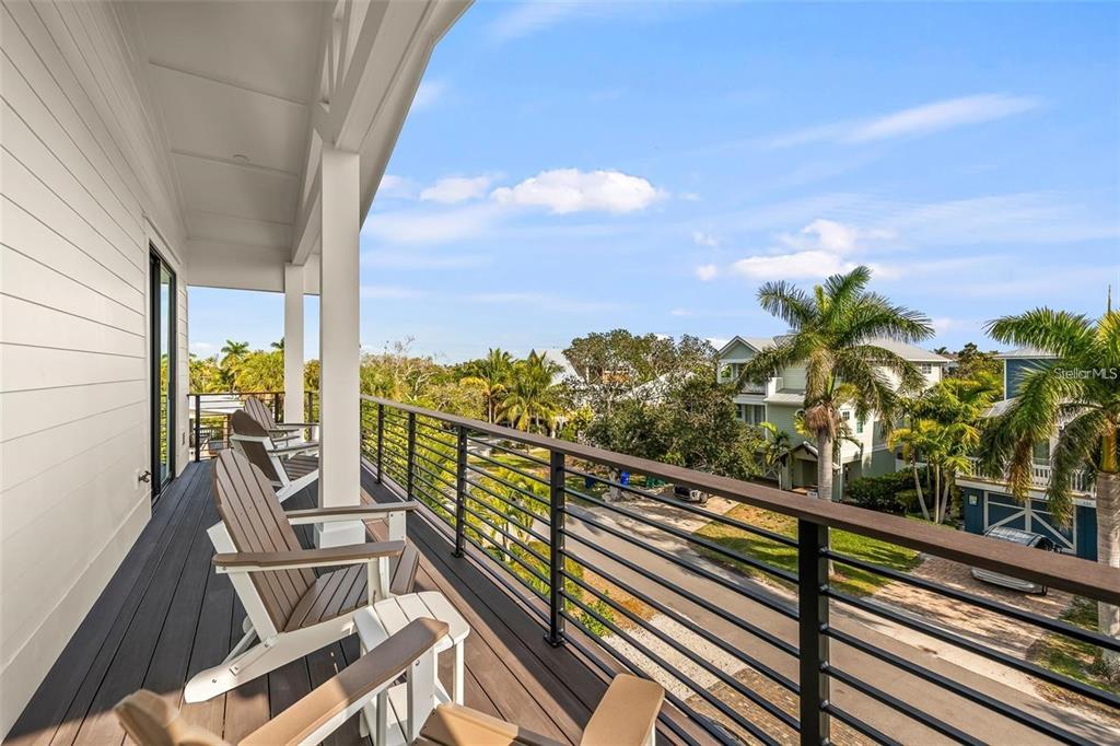 112 Maple Avenue Anna Maria, FL 34216 - Photo 59 of 91 a view of a balcony with chairs
