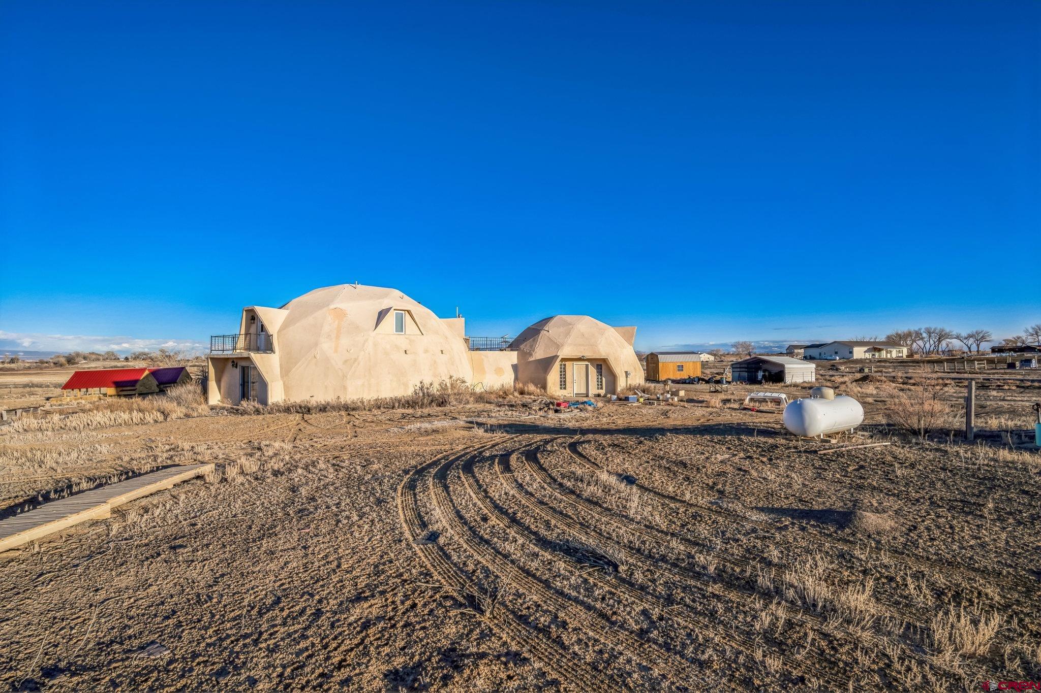2279 1300th Road Delta, CO 81416 - Photo 2 of 8 a view of a backyard with a sink