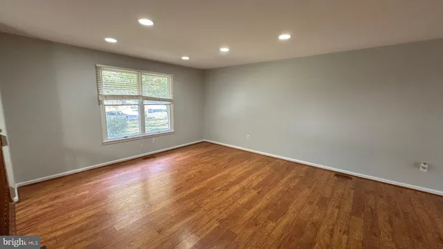 a view of a livingroom with a kitchen