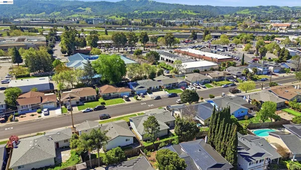 an aerial view of a city with lots of residential buildings