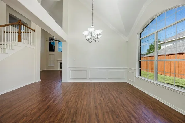 a view of livingroom with hardwood floor and a ceiling fan