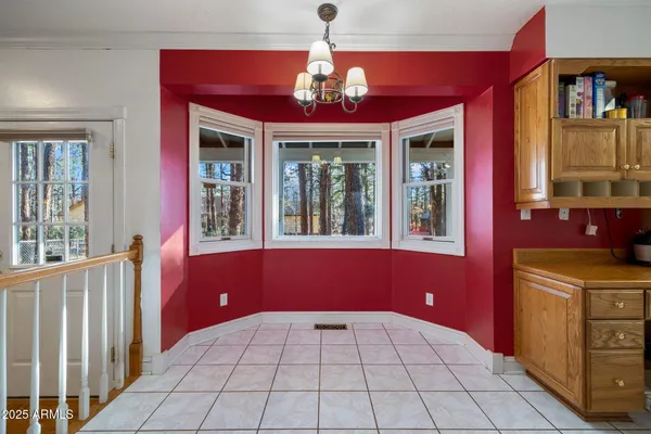 a kitchen with a stove a sink and a refrigerator