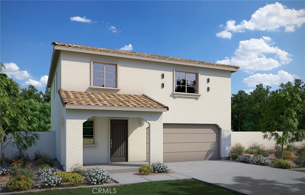 5465 Larkspur Road Banning, CA 92220 - Photo 1 of 3 a front view of a house with garden
